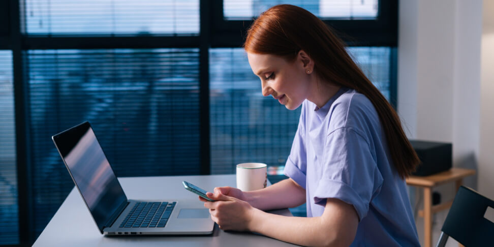 a coder siting in a front of a computer